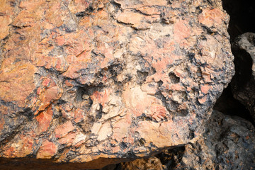 Orange stone background, geology close up