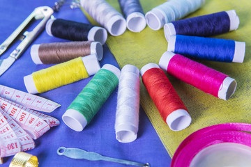 Sewing equipment above fabric