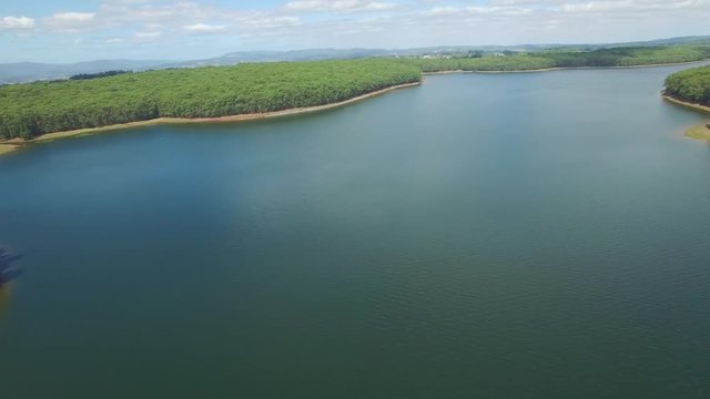 Drone flight across beautiful lake in Melbourne, Australia
