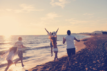 people group running on the beach