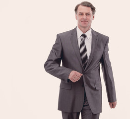 in all growth.a successful businessman, confidently striding forward.