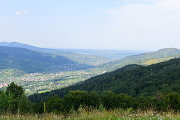 View of the city and the forest from a high mountain
