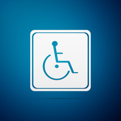 Disabled handicap icon isolated on blue background. Wheelchair handicap sign. Flat design. Vector Illustration