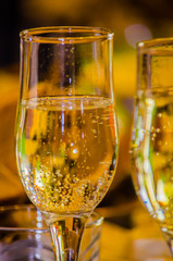 2 glasses of champagne on a beautiful side