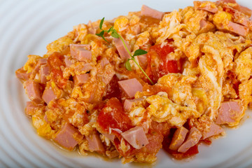 Scramble with sausages