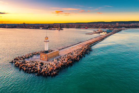 Fototapeta Aerial view of lighthouse at sunset in Varna, Bulgaria