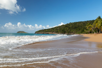 Orange sand and crushing wave at 