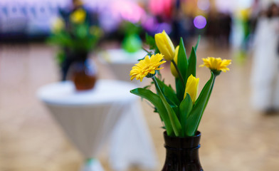yellow flowers on the table cafe