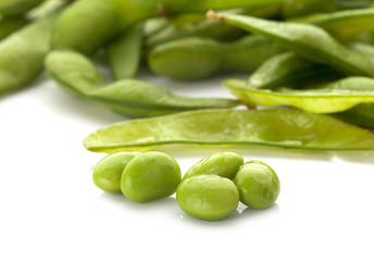 Green soybeans isolated on white background.