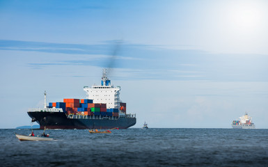 Cargo container ship carrying container import and export  goods running around container yard port...