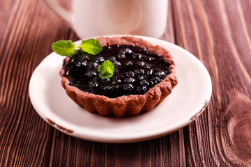 Blueberry and jam mini tart