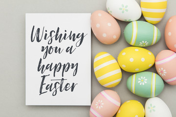 Colourful easter eggs with a handwritten easter message