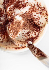 Hot chocolate and marshmallow sprinkled with chocolate chips.