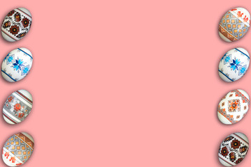 Happy Easter card. Colorful shiny easter eggs on pink background. Copy space for text.