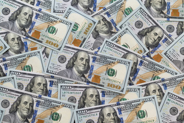 One hundred dollars, new 100 US dollar. One hundred dollars background. Concept finance, investments, deposits.