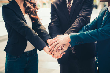 Teamwork concept, Success team, Cooperation concept, Business people joining hands hold togethet in team for successful, Vintage tone.