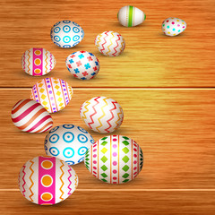 Painted eggs on wooden background. Happy Easter Concept.