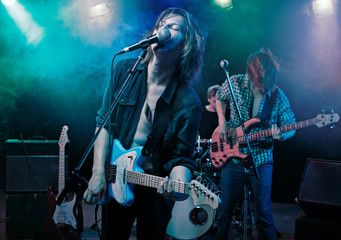 Fototapeta na wymiar Performance of the rock band.