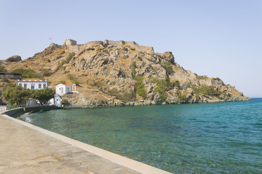 Limnos fortress on rocks with seaside view. Myrina city bay under medieval stronghold on Greek island.