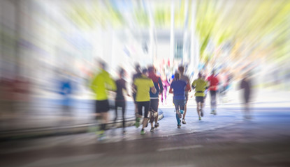 silhouette of people running marathon