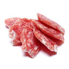 Dried sliced organic salami sausage on white background