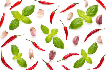Basil and garlic isolated on white background, top view. Wallpaper abstract composition of...