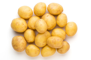 New potato and rosemarin isolated on white background close up.