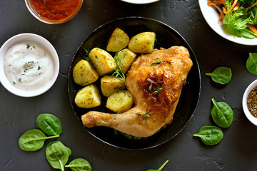 Grilled chicken leg with baked potato