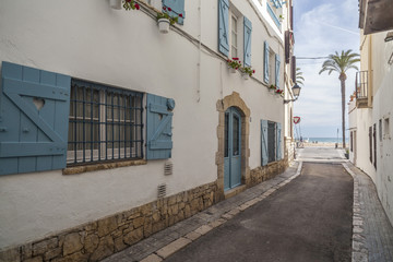 Street in catalan village of Sitges, province Barcelona, Catalonia, Spain.