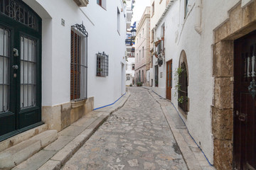 Street in catalan village of Sitges, province Barcelona, Catalonia, Spain.