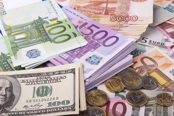 Dollar, euro, ruble banknotes, coins