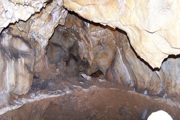 Stalactites and stalagmites inside a cave