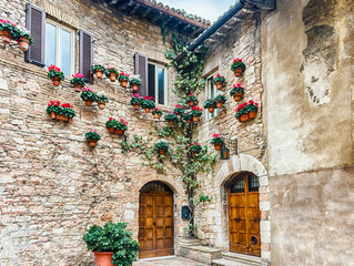 Fototapeta na wymiar Historical buildings in the old city center of Assisi, Italy