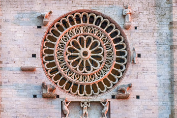 Rose window of the medieval Cathedral of Assisi, Italy