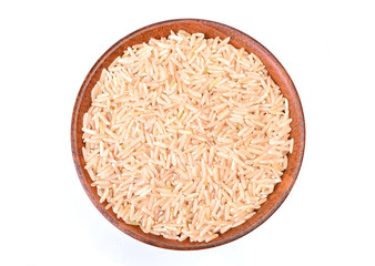 Rice in a wood bowl on a white background
