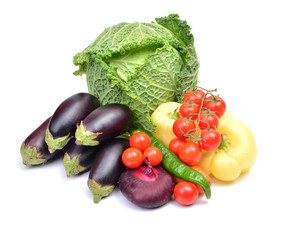 Savoy cabbage, cherry tomatoes, eggplants and  pepper on a white background