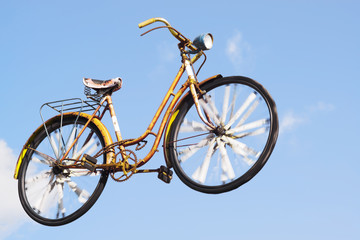 Fototapeta na wymiar bike bycicle flying with blue sky
