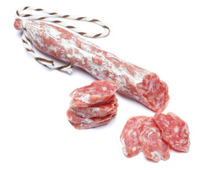 Dried organic salami sausage on white background