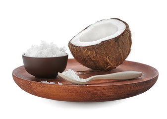 Composition with fresh coconut flakes on white background