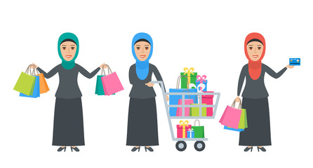muslim arab women with shopping bags and cart
