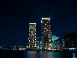 Fototapeta na wymiar Illuminated condominiums at Toyosu, Tokyo, Japan
