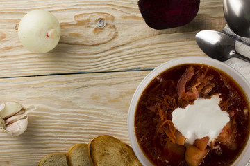 plate with a winter soup-borscht