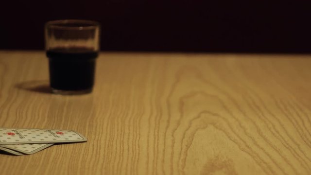 grandfather and granddaughter play cards