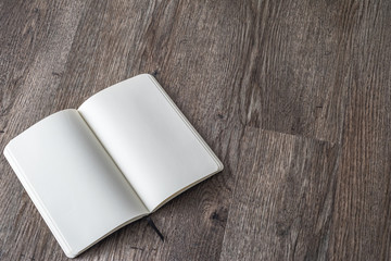 Blank book mock up, catalog, magazines, brochure, or note cover template, white paper texture on wood table