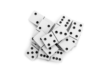 Heap of domino pieces on white background. Top view.