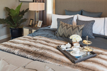 set of coffee cup on tray in classic master bedroom