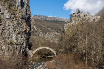 Fototapeta na wymiar Amazing landscape of Bridge of Kontodimos or Lazaridis in Vikos gorge and Pindus Mountains, Zagori, Epirus, Greece
