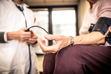 Nurse assisting patient in an hospice