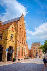 Naklejka premium Beautiful narrow streets and traditional houses in the old town of Bruges (Brugge), Belgium