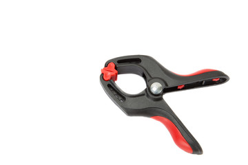 Plastic spring clamp on white background, Isolated.